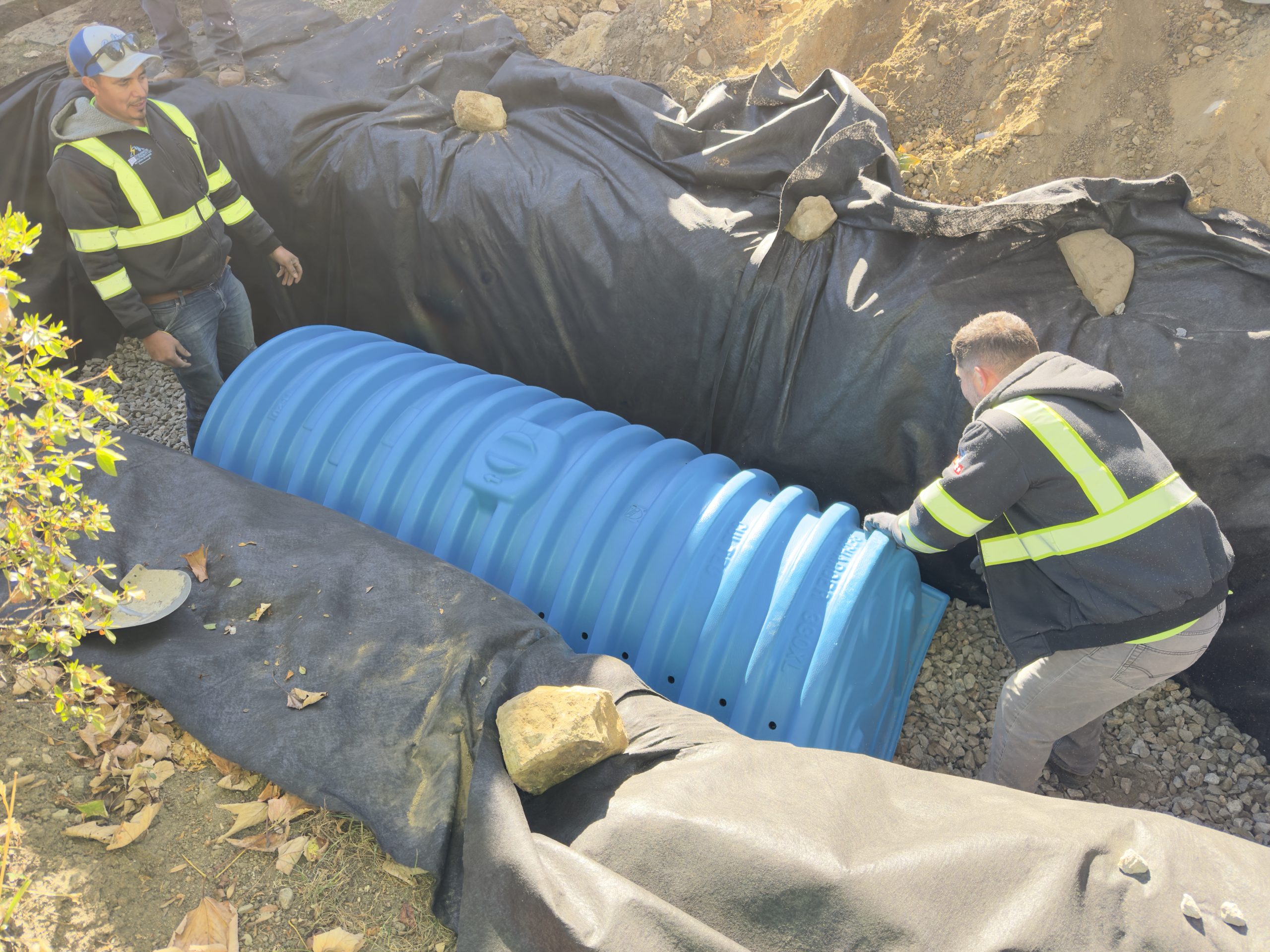 Small dry well drainage system installation